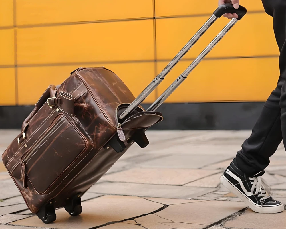 leather luggage with wheels